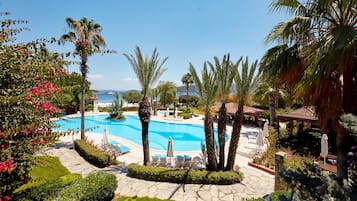 Seasonal outdoor pool, pool umbrellas, pool loungers