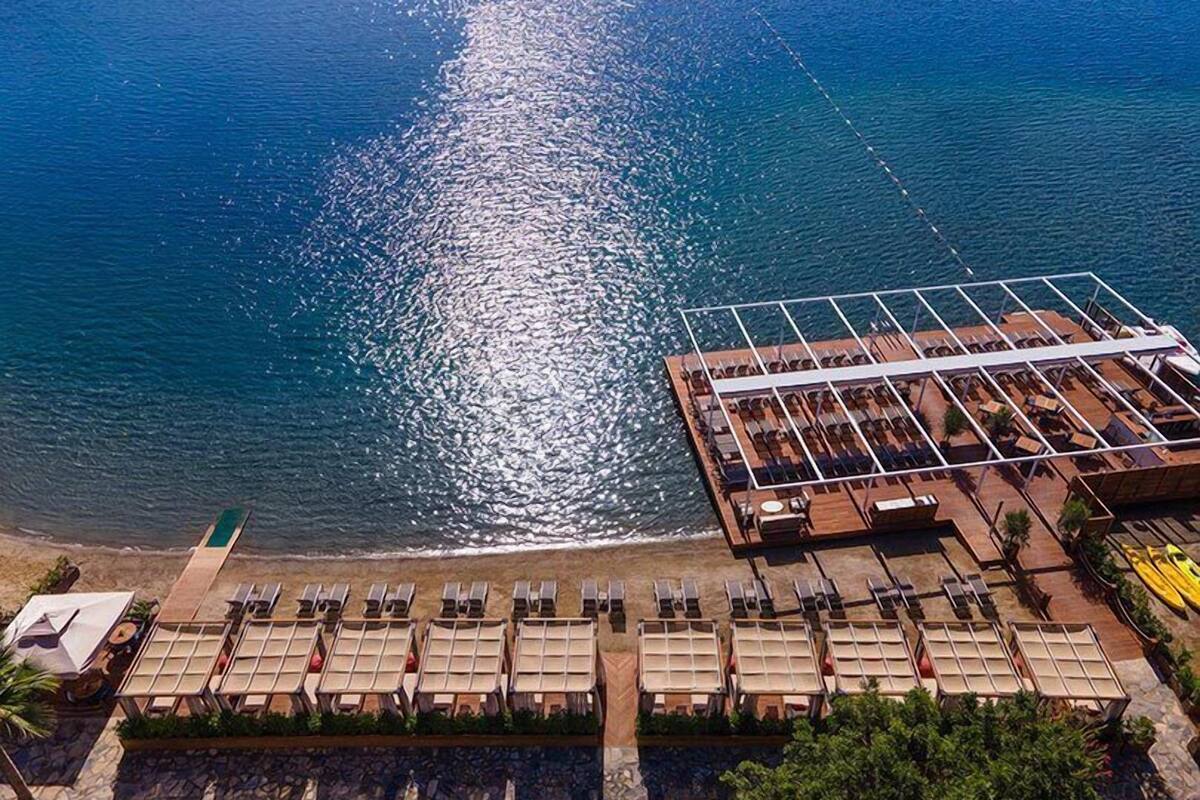 private beach, sun-loungers, beach umbrellas, beach towels