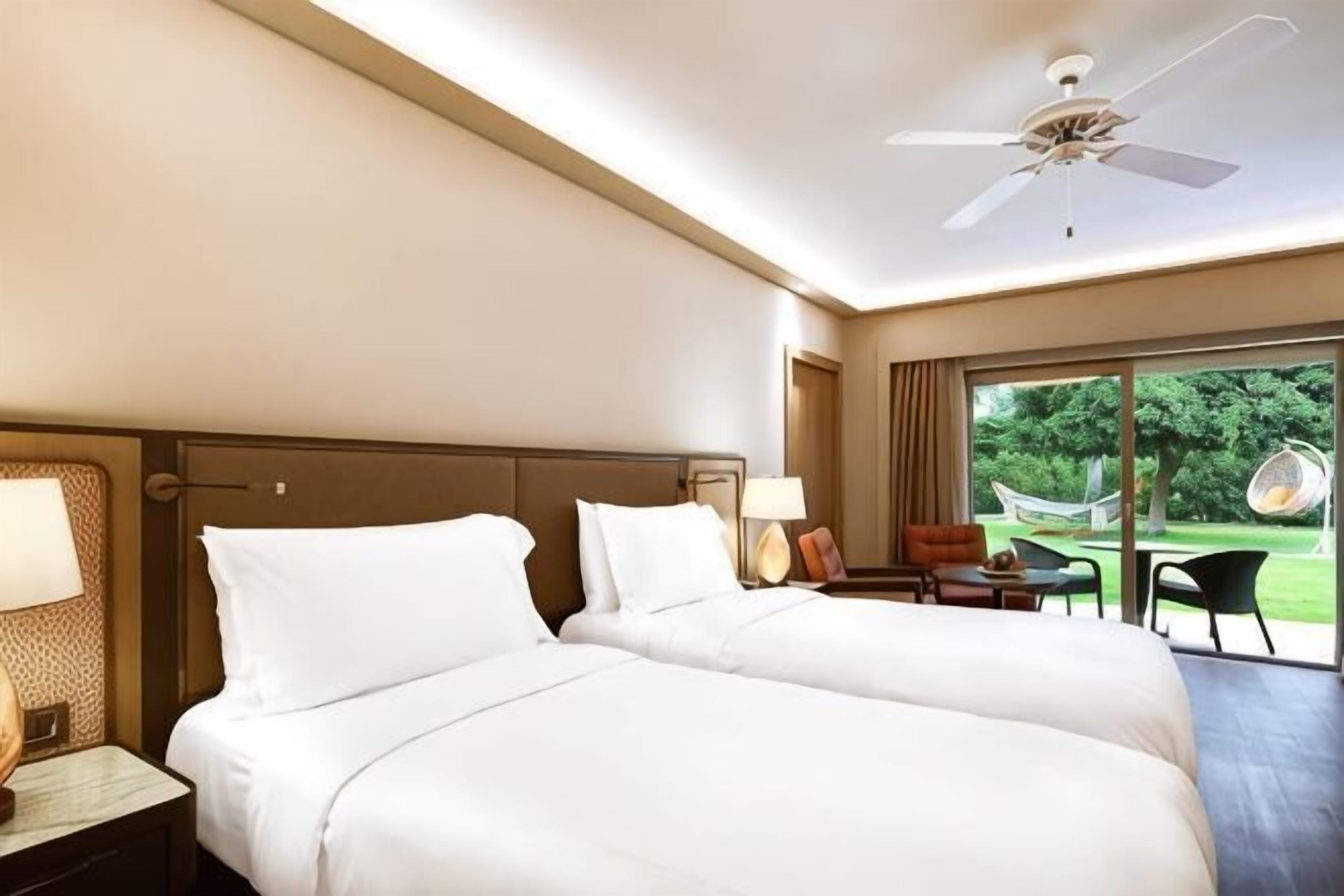 Premium bedding, down comforters, minibar, in-room safe