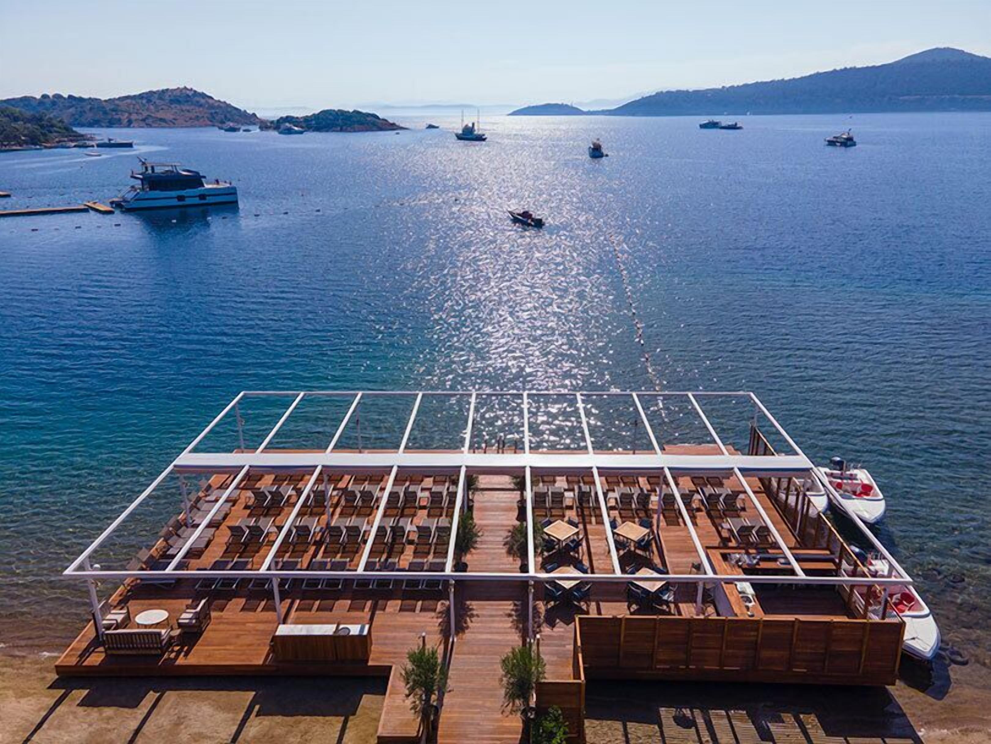 private beach, sun-loungers, beach umbrellas, beach towels