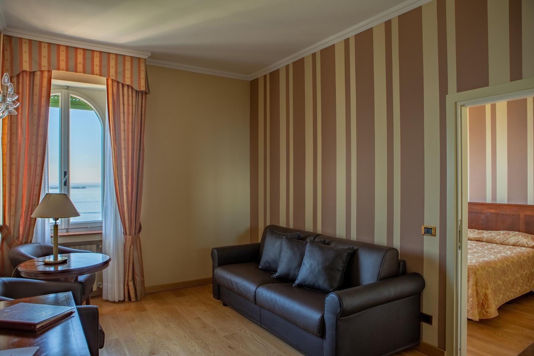junior suite, lake view | 1 bedroom, minibar, in-room safe, desk