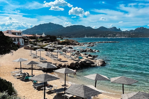 Private beach, sun loungers, beach umbrellas