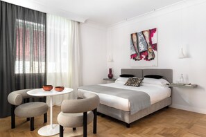 Suite junior, 1 cama King size | Ropa de cama de alta calidad y minibar 