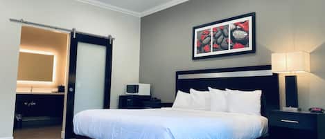 Habitación individual estándar | Escritorio, tabla de planchar con plancha, wifi gratis y ropa de cama