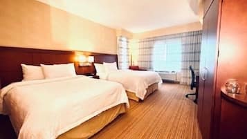 Down duvets, pillow-top beds, in-room safe, desk