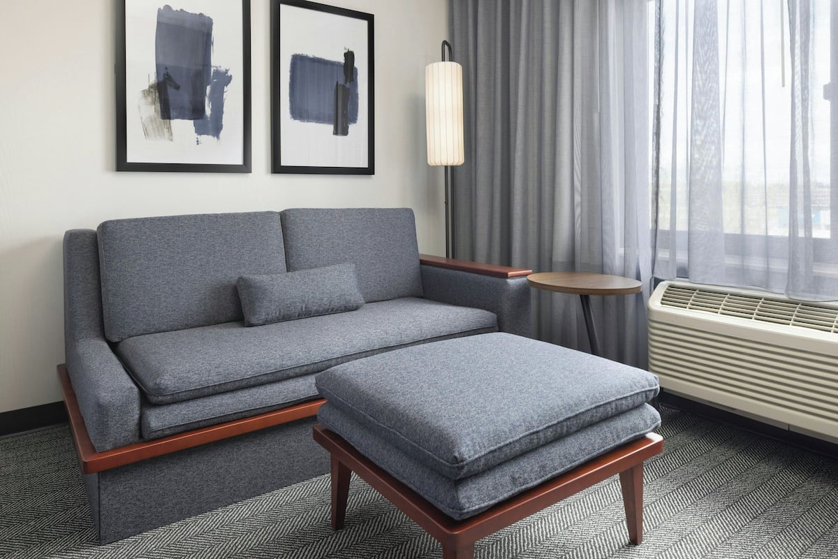 Donzen dekbedden, pillowtop-bedden, een kluis op de kamer, een bureau