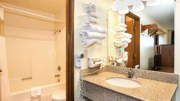 Combined shower/tub, hair dryer, towels, soap