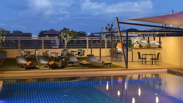 Outdoor pool, pool umbrellas, pool loungers