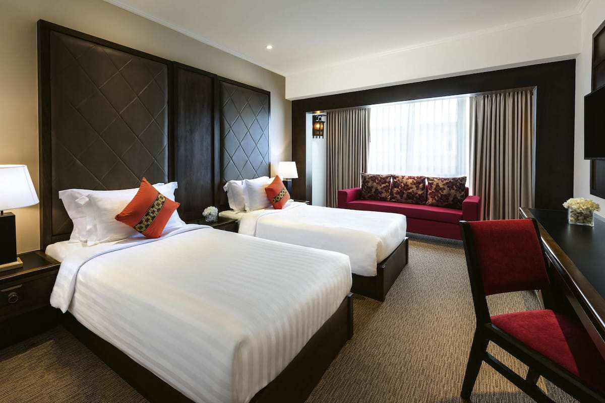 Tvåbäddsrum Deluxe - 2 enkelsängar | 1 sovrum, Select Comfort-madrasser och värdeförvaringsskåp på rummet