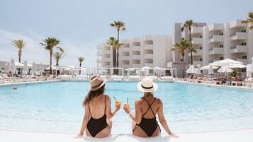 Indoor pool, outdoor pool, pool umbrellas, sun loungers