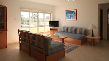 Apartment, 2 Bedrooms | Living area | TV