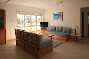 Apartment, 2 Bedrooms | Living area | TV