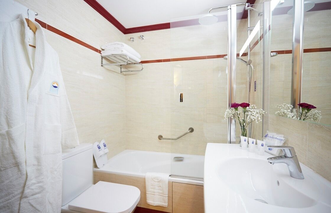 hair dryer, bidet, towels, soap