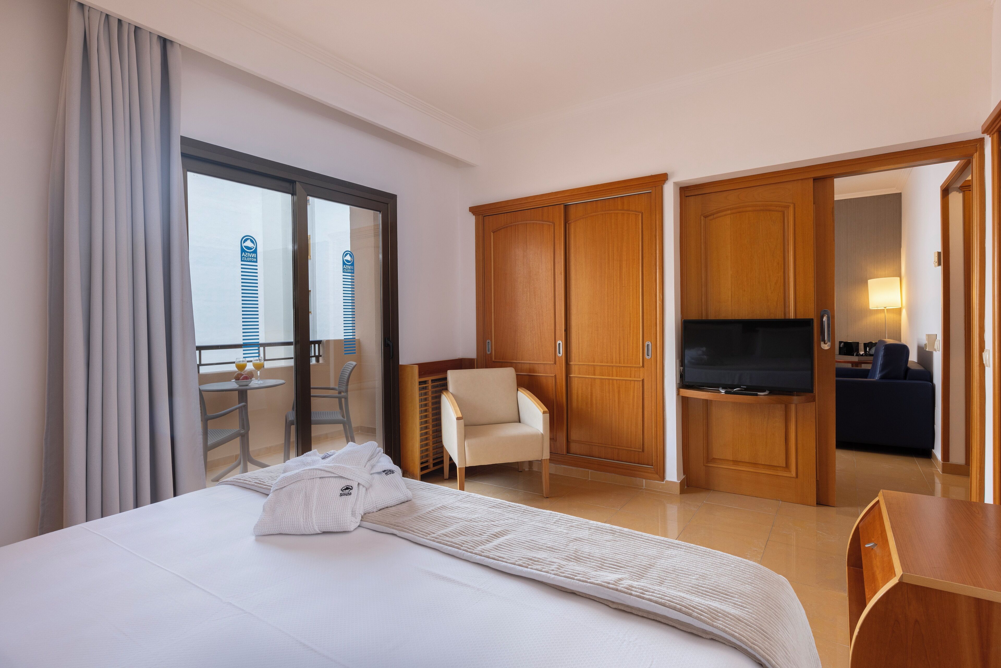 junior suite | 1 bedroom, in-room safe, individually furnished, desk