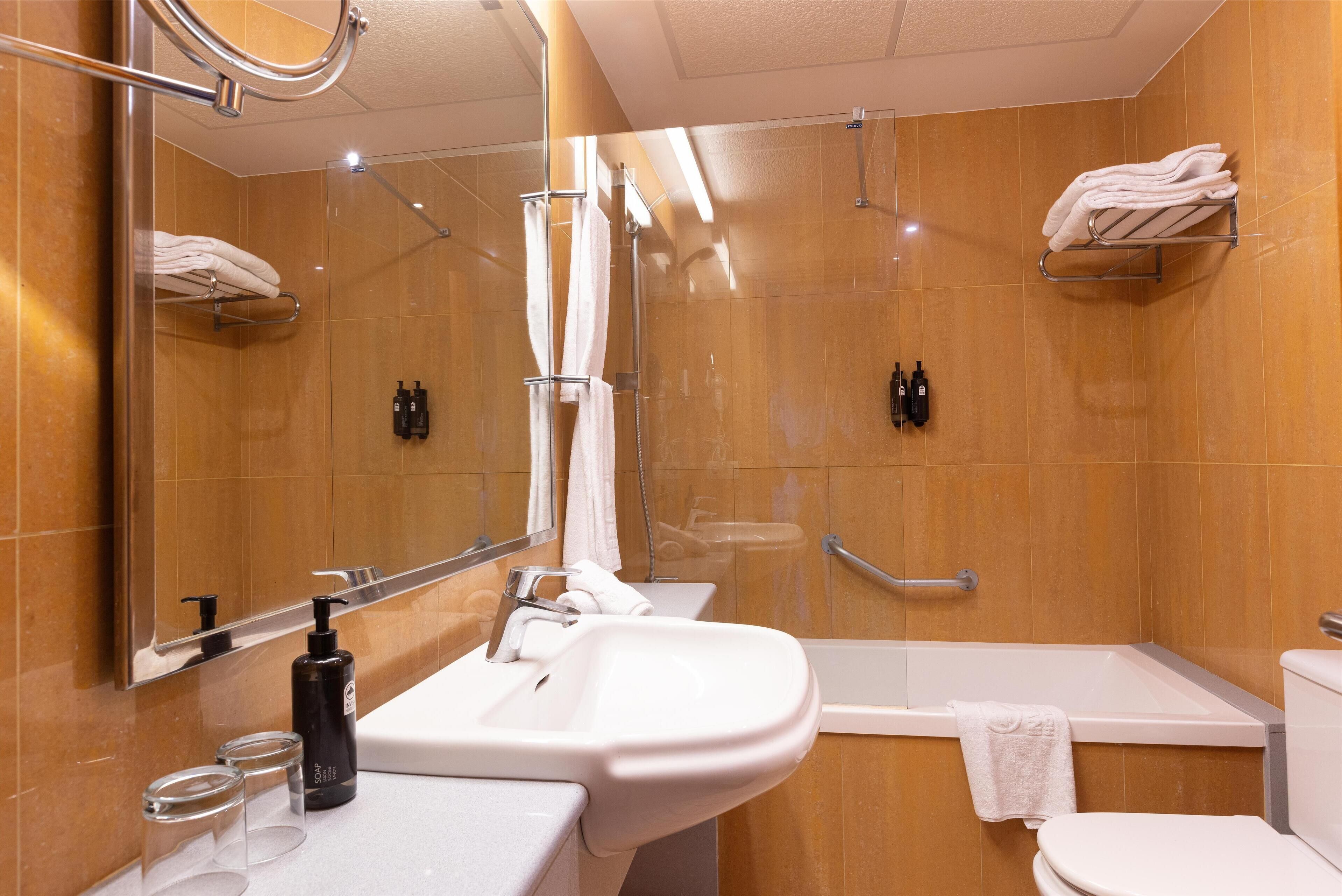 hair dryer, bidet, towels, soap