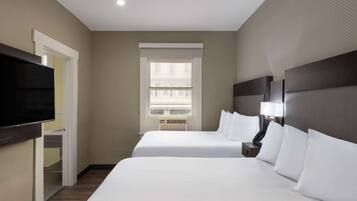 Pillow-top beds, desk, blackout curtains, iron/ironing board