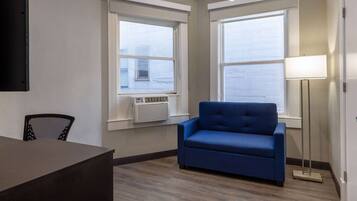 Pillow-top beds, desk, blackout curtains, iron/ironing board