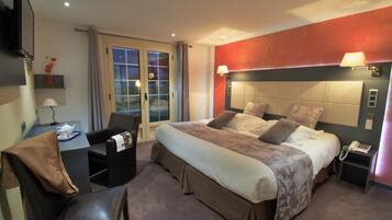 Ropa de cama de alta calidad, minibar, escritorio y wifi gratis