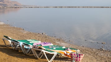 Serviço de traslado de/para a praia grátis, espreguiçadeiras
