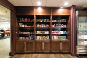 A snack display with various packaged foods. - Holiday Inn Exp Walterboro by IHG (Walterboro)