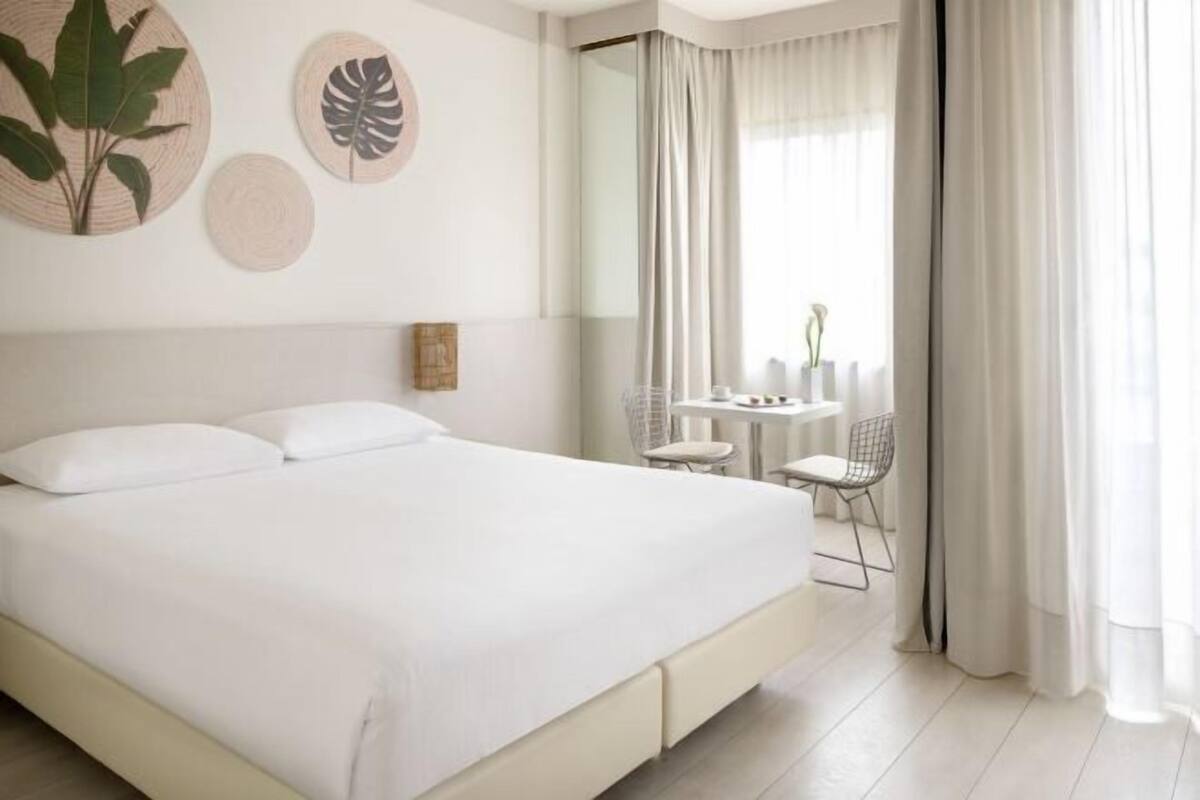Hypo-allergenic bedding available, down comforters, minibar