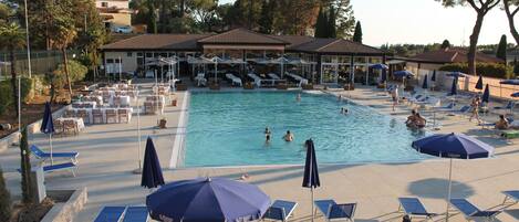 Outdoor pool, pool umbrellas, pool loungers