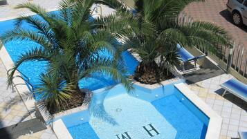 Outdoor pool, sun loungers