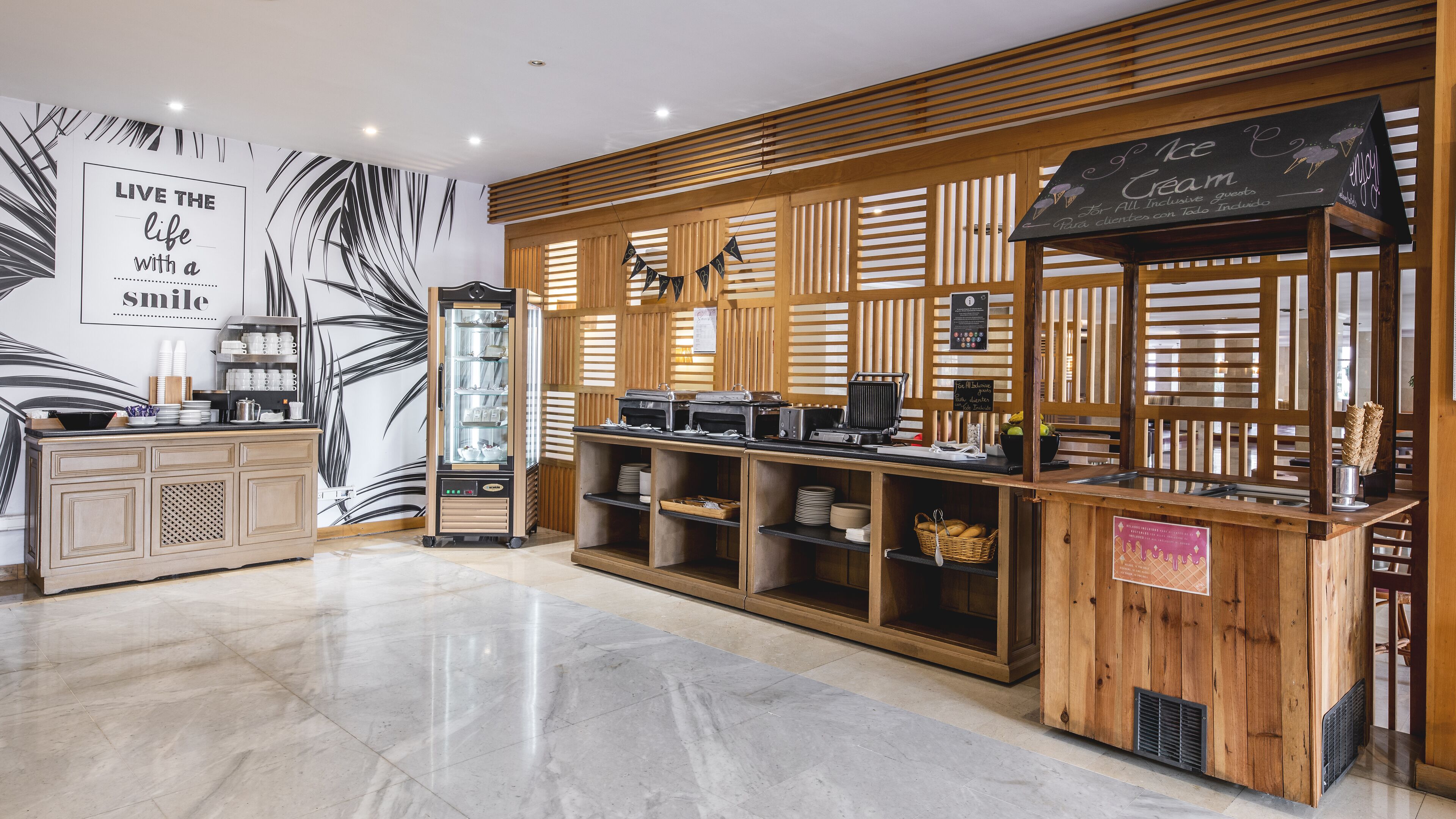 A cafe with a wooden counter, a coffee machine, and a chalkboard menu.