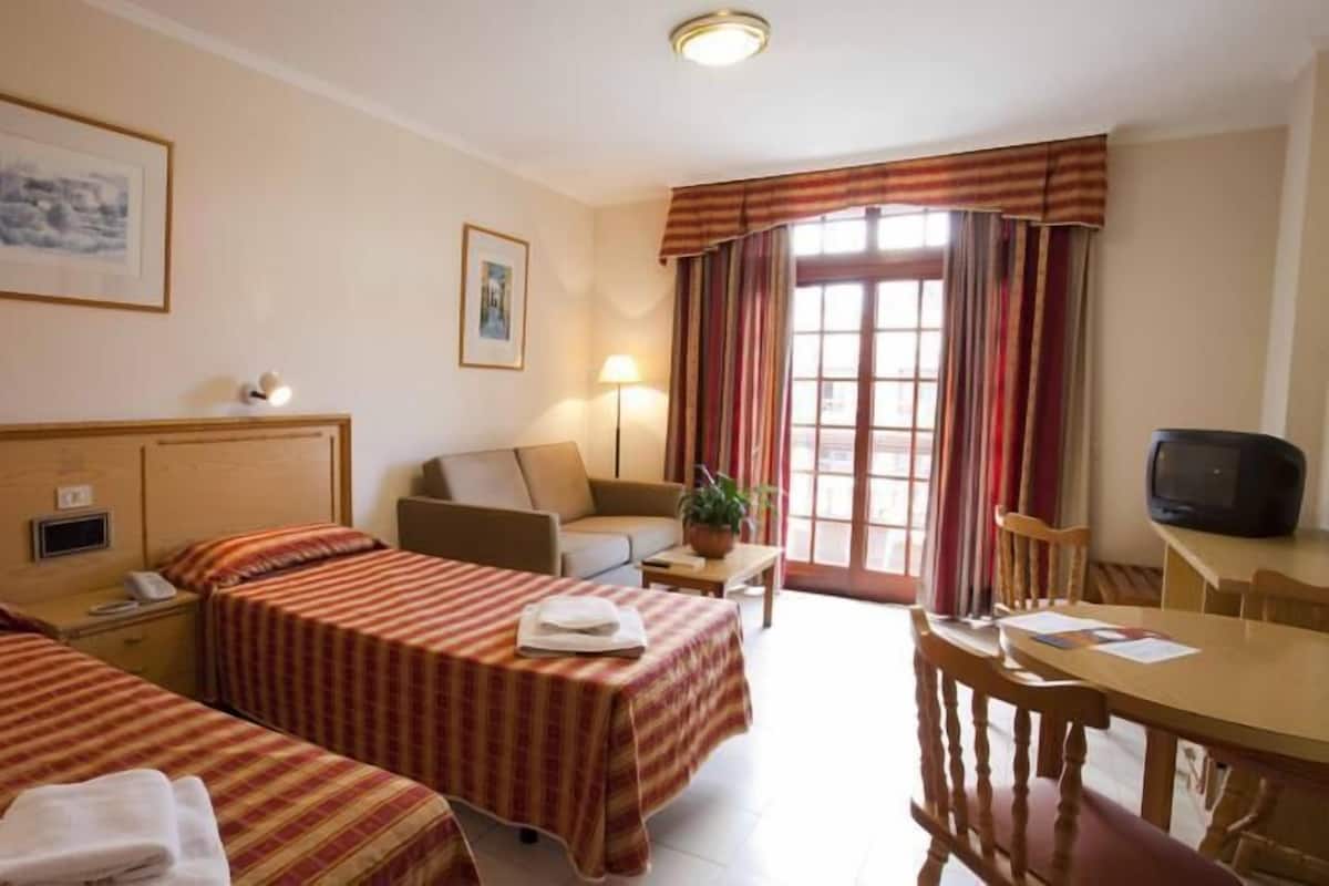 Desk, WiFi (free), bed sheets