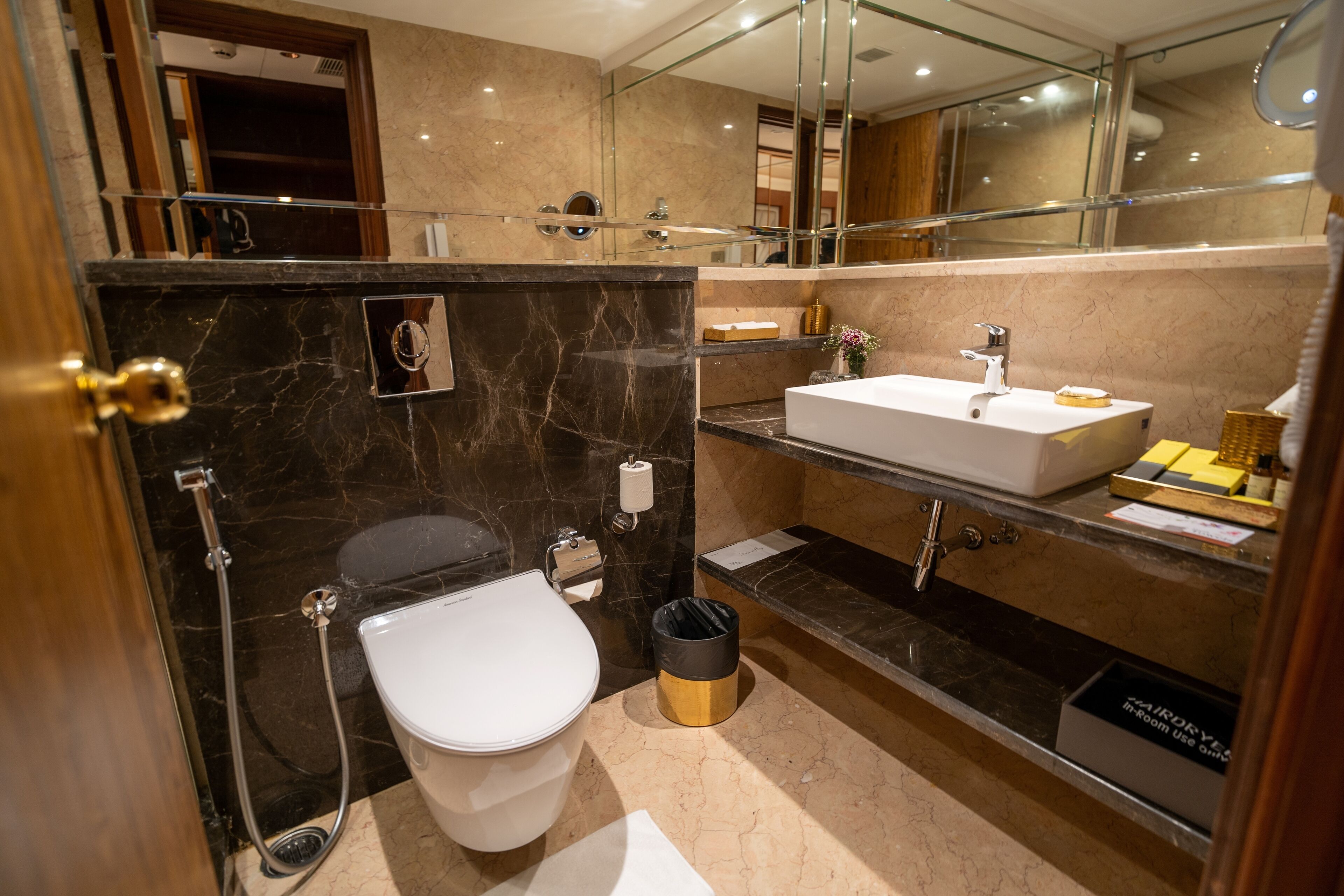deluxe king | bathroom | rainfall showerhead, free toiletries, hair dryer, bathrobes
