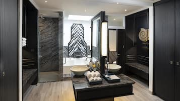 Separate tub and shower, rainfall showerhead, free toiletries