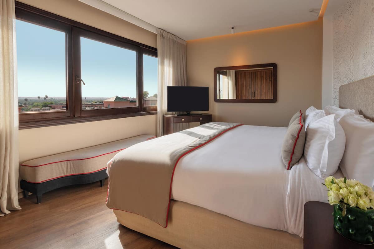 Suite Deluks | 1 kamar tidur, seprai premium, minibar, dan brankas