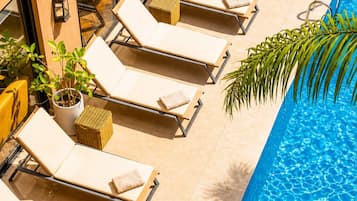 Outdoor pool, pool umbrellas, pool loungers