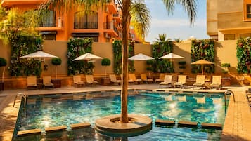 Outdoor pool, pool umbrellas, pool loungers