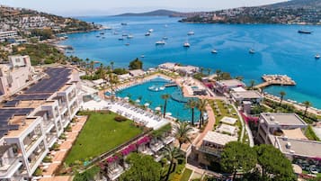 Indoor pool, outdoor pool, pool umbrellas, sun loungers