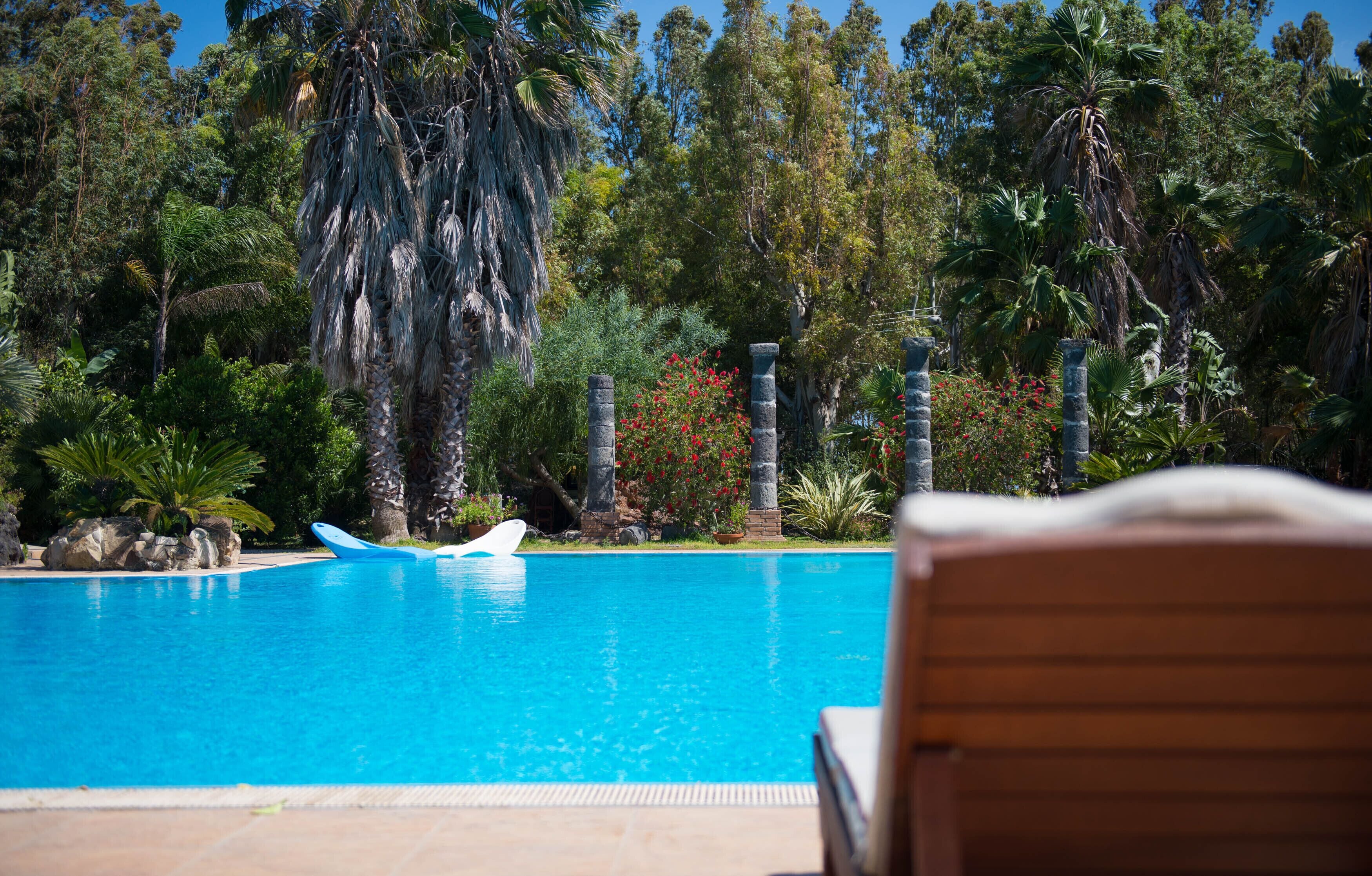 outdoor pool, pool loungers