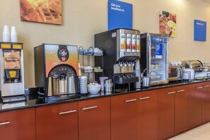 Free daily continental breakfast  - Comfort Inn & Suites LaGuardia Airport (Maspeth)