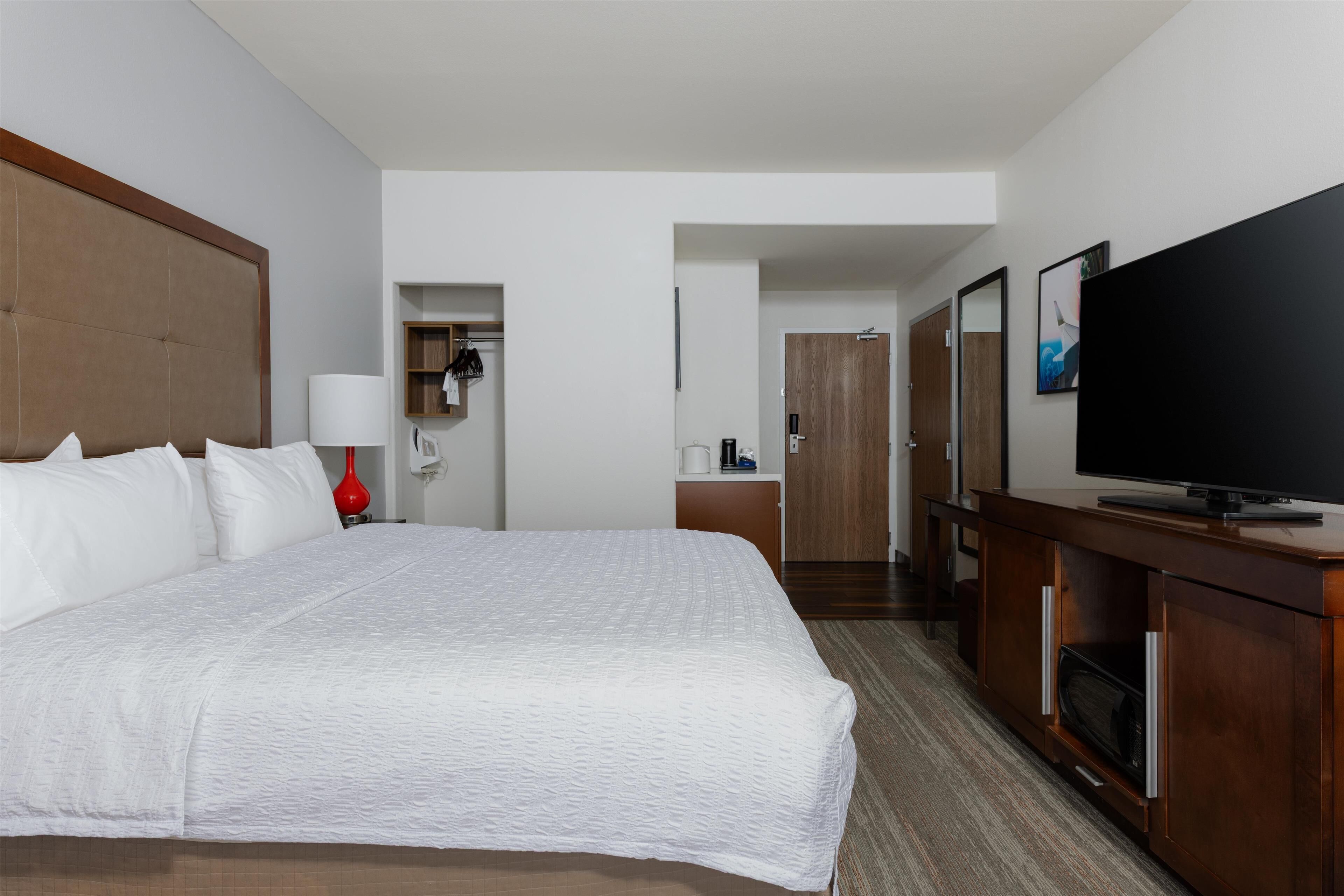 desk, blackout curtains, iron/ironing board, free cots/infant beds