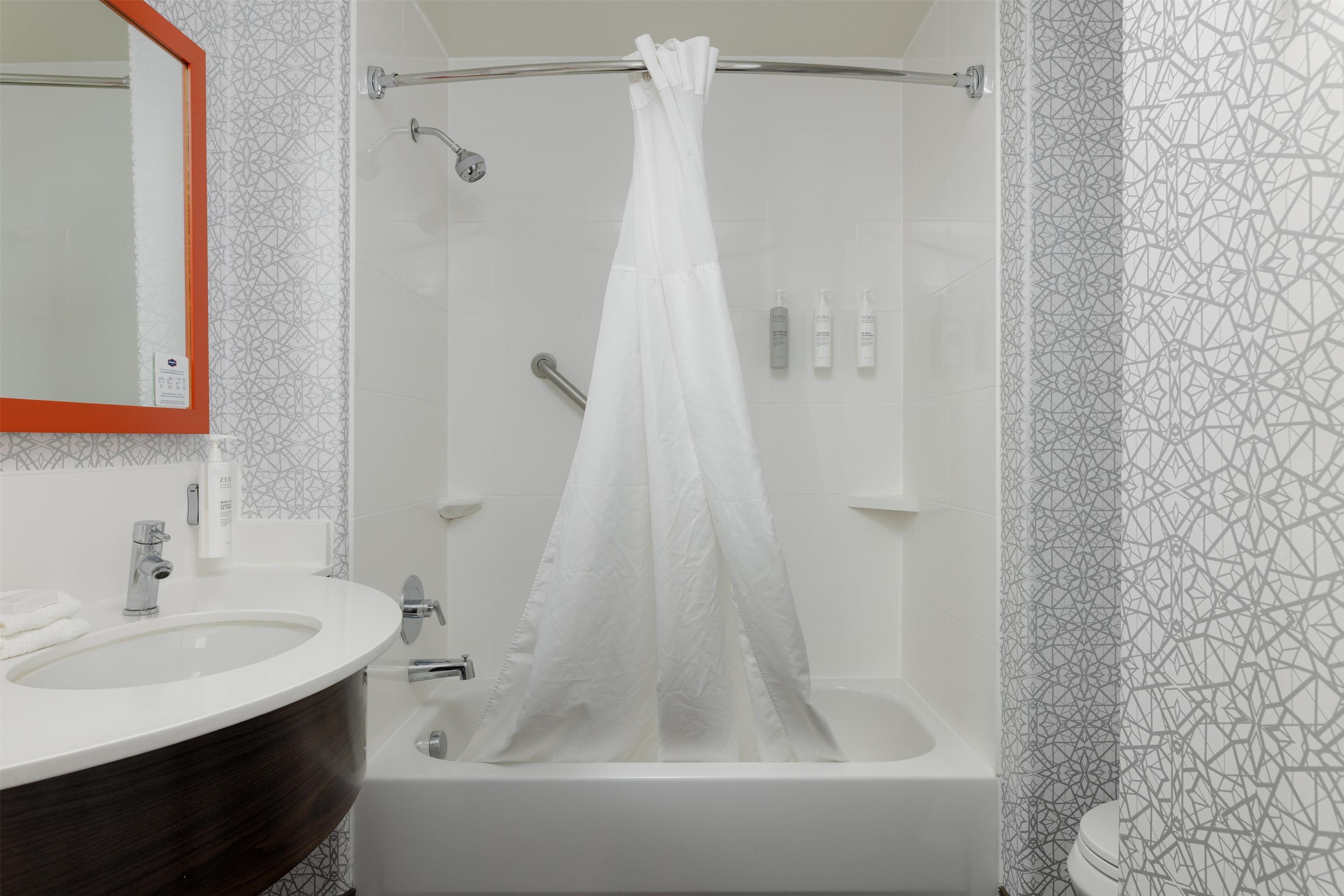 combined shower/bathtub, free toiletries, hair dryer, towels