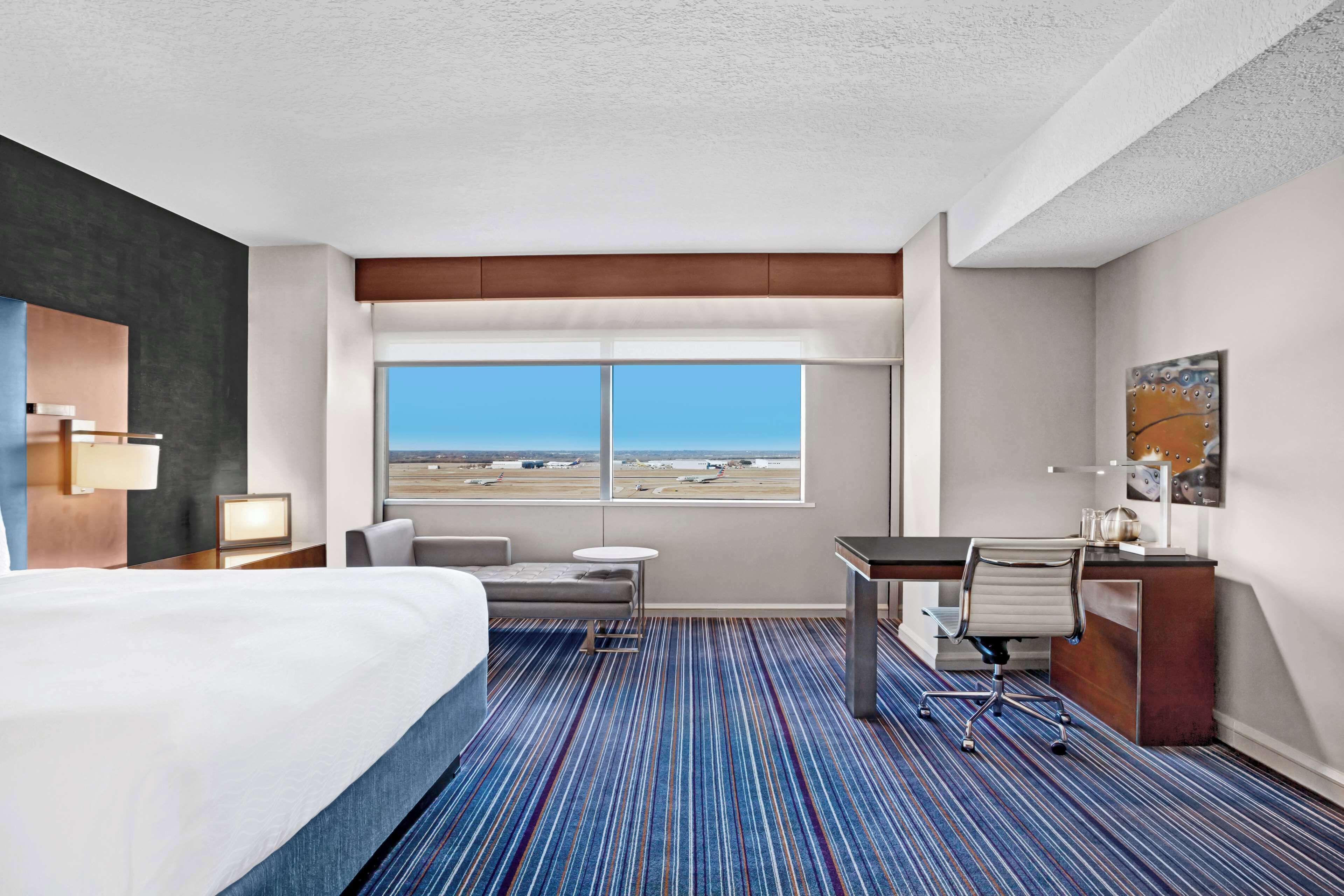 room, 1 king bed, view (runway view) | premium bedding, down duvets, pillow-top beds, minibar