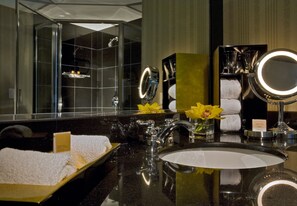 Separate bathtub and shower, designer toiletries, hair dryer, bathrobes