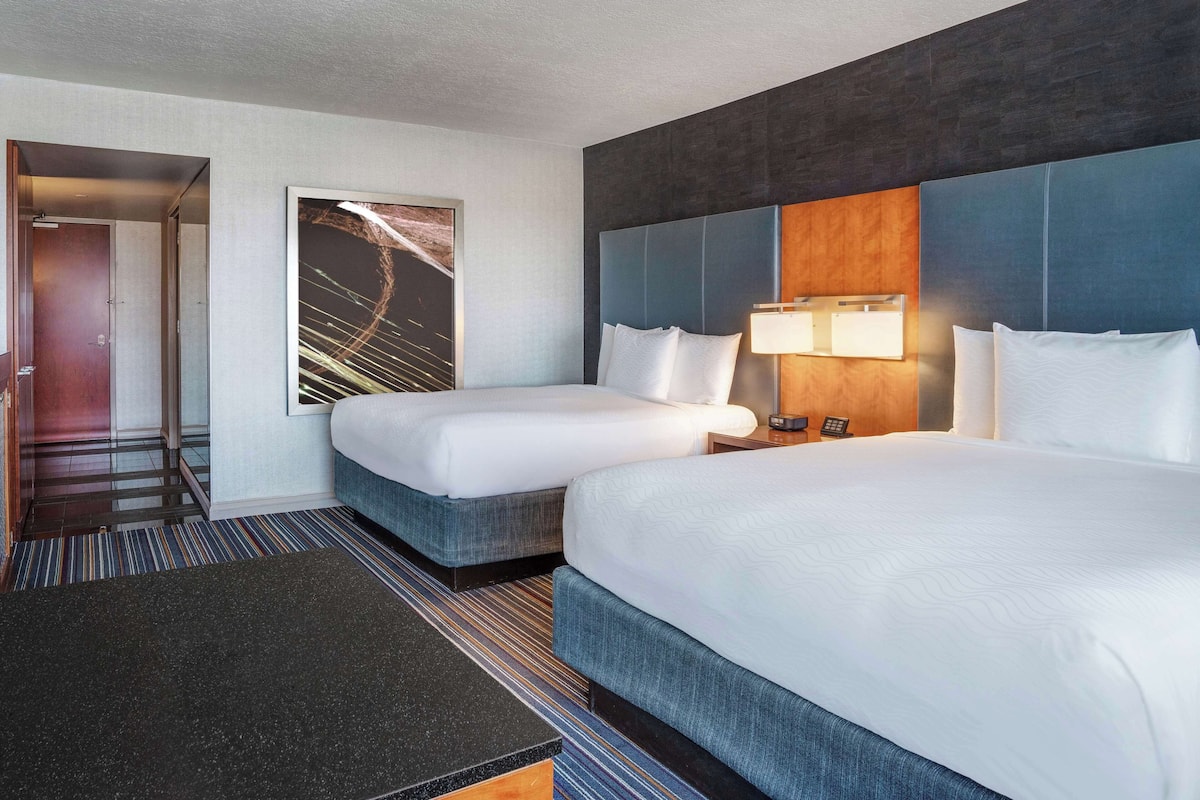 Premium bedding, down comforters, pillowtop beds, minibar