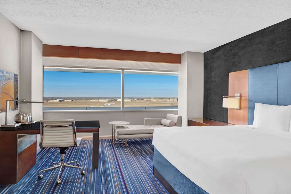 Room, 1 King Bed (Runway View) | Premium bedding, down comforters, pillowtop beds, minibar