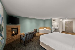Suite, 1 cama de matrimonio grande, no fumadores, chimenea (Garden/Jetted Tub) | Ropa de cama hipoalergénica y colchones con acolchado adicional
