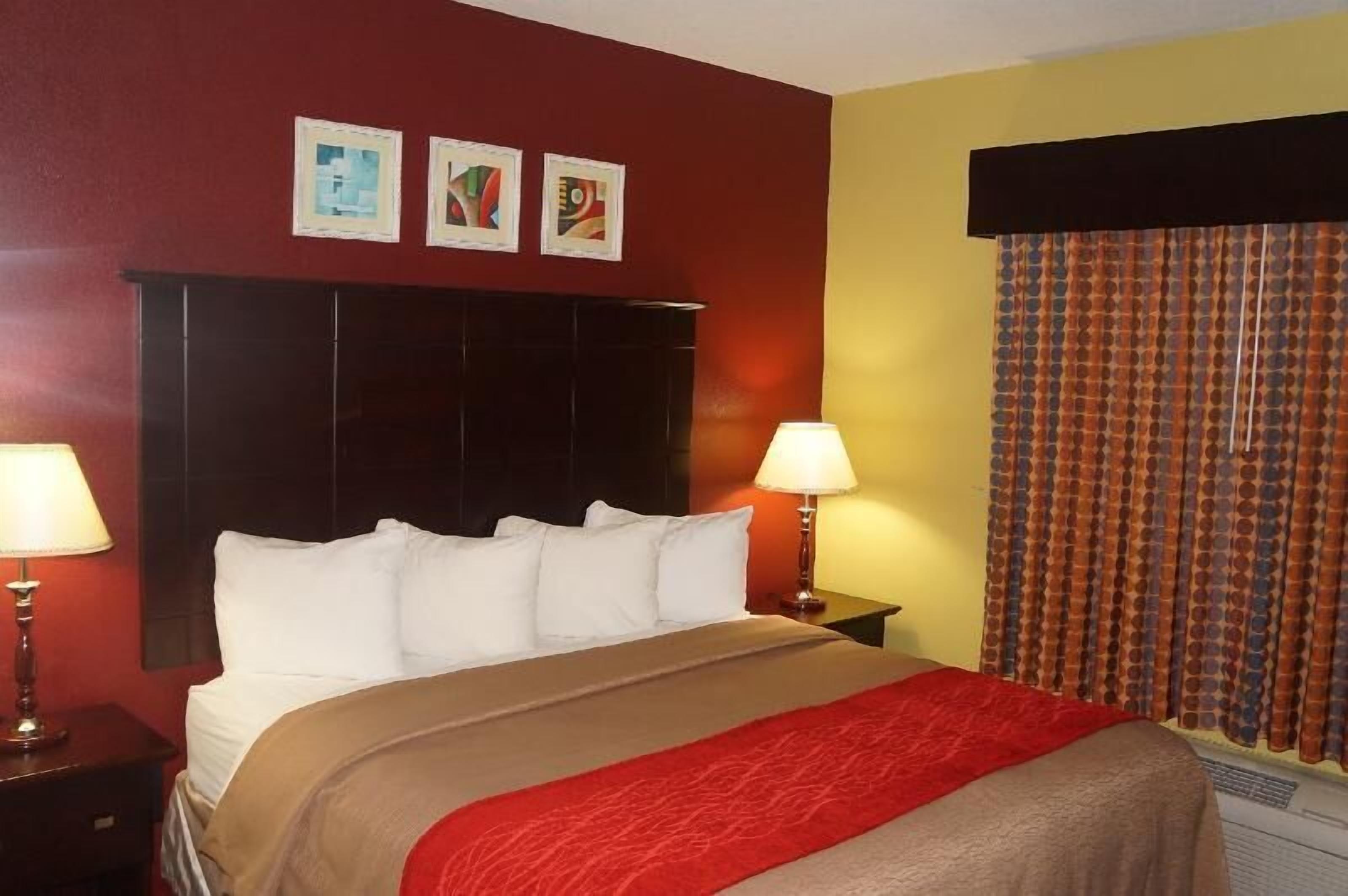 Desk, laptop workspace, blackout curtains, iron/ironing board