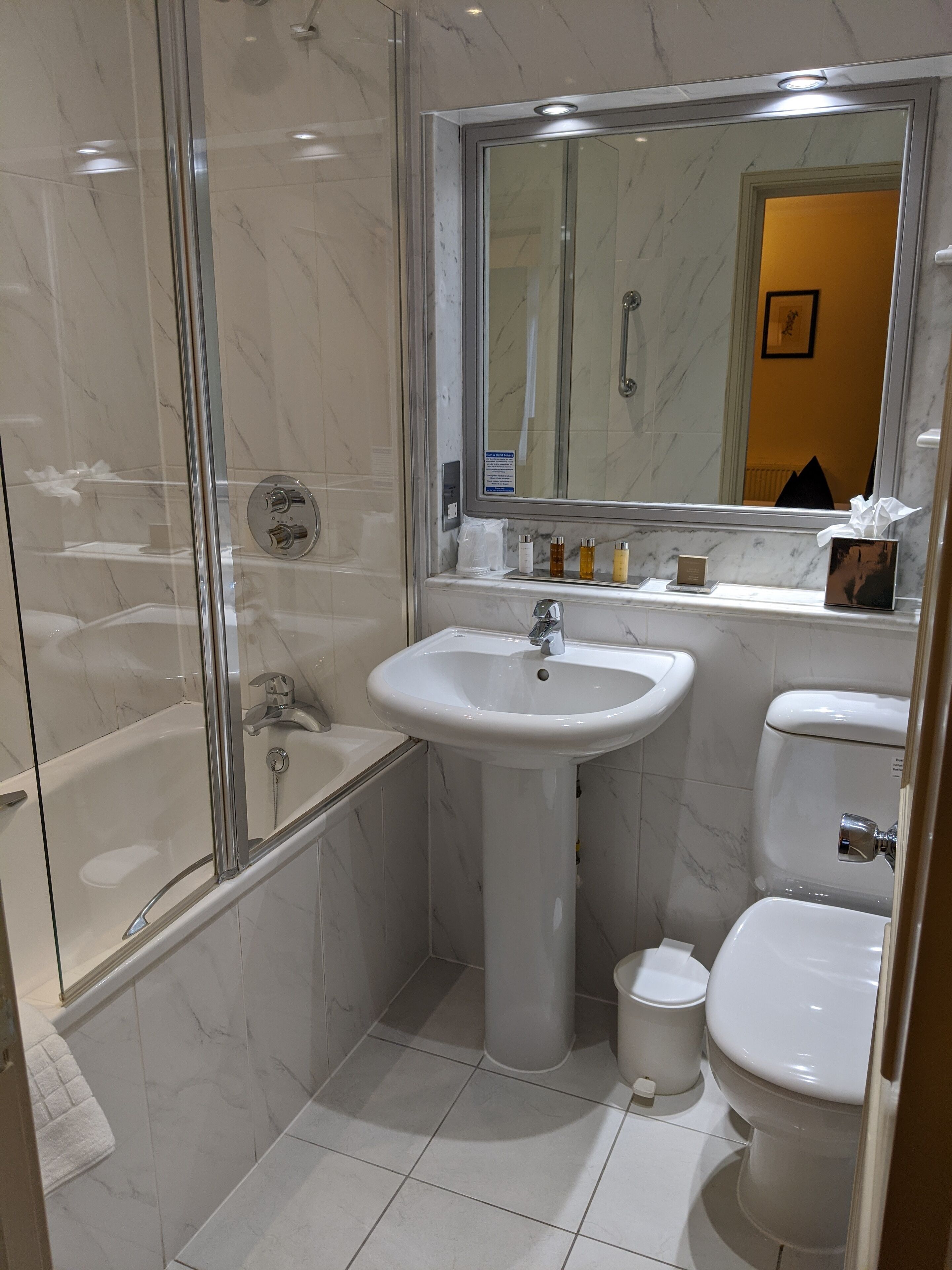 combined shower/bathtub, free toiletries, hair dryer, towels