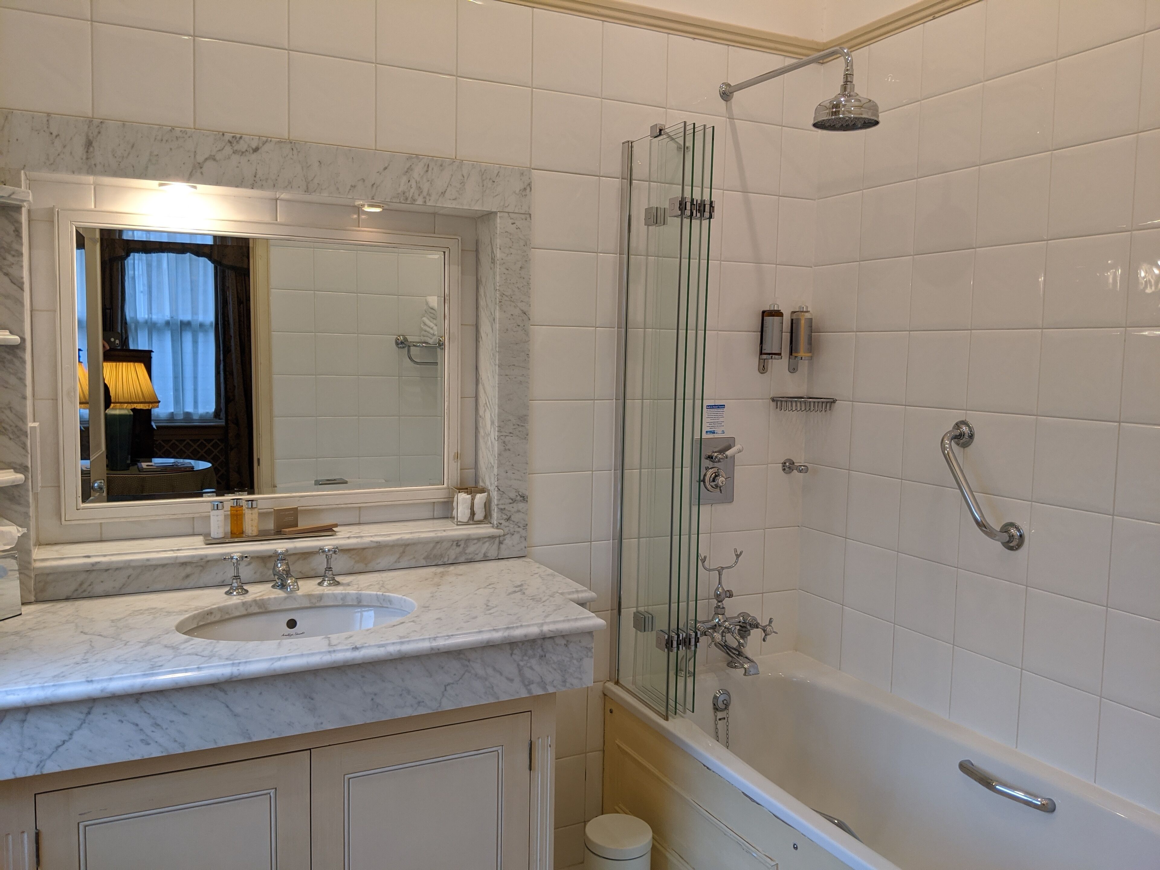 combined shower/bathtub, free toiletries, hair dryer, towels