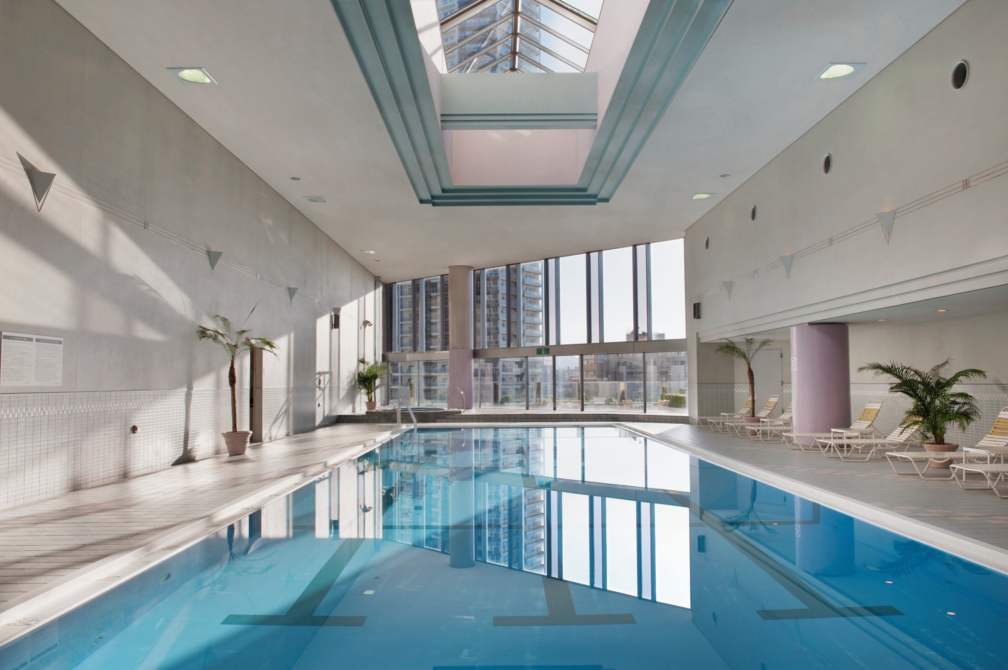 Indoor pool, open 9:00 AM to 7:00 PM, pool loungers