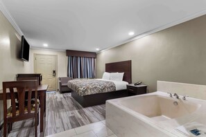 Suite, 1 King Bed, Non Smoking (Jacuzzi) | Soundproofing, iron/ironing board, free WiFi, bed sheets - Americas Best Value Inn Houston Heights at I-45 (Houston)