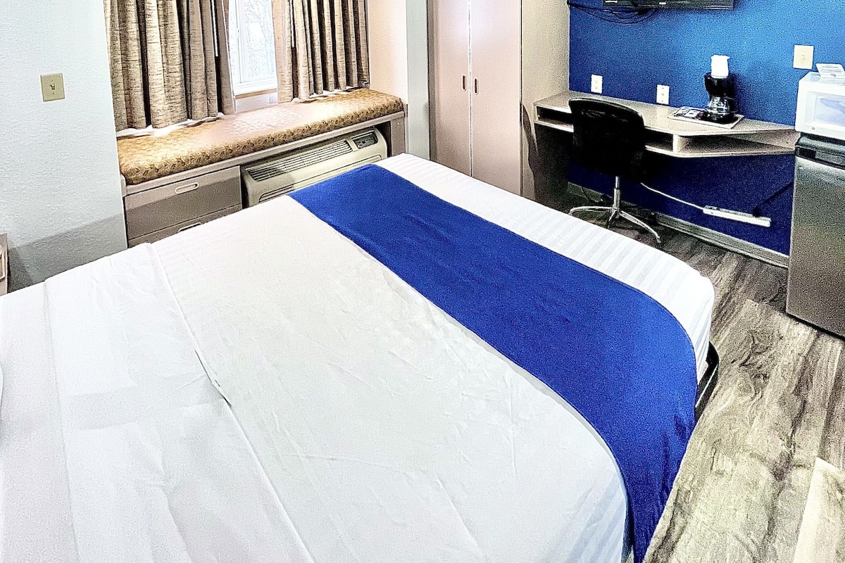 Premium bedding, desk, blackout curtains, iron/ironing board